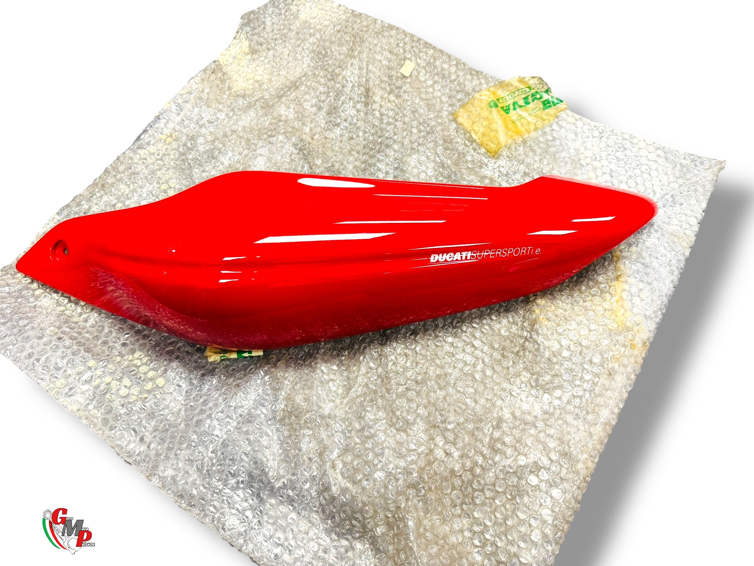 Dessous de selle gauche rouge NEUF - Ducati